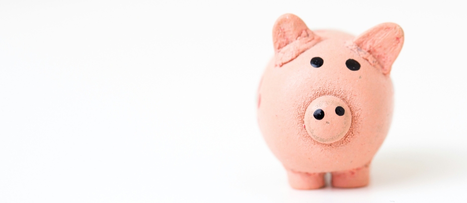 E-commerce winstgevendheid: Slim ondernemen voor blijvende groei Roze spaarvarken als symbool voor sparen en winst maken met online ondernemen